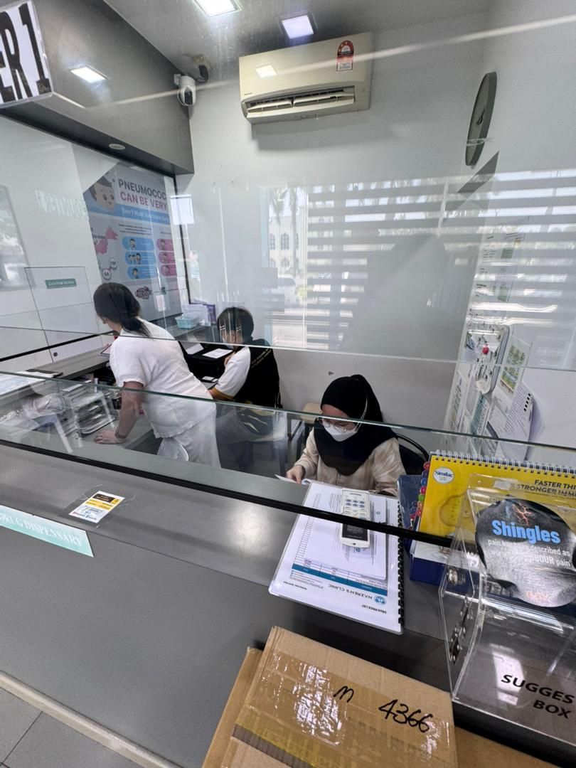 Dispensary counter with staff